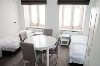 Хостелы Rodmos Hostel Люблин Односпальная кровать в общем номере для мужчин и женщин-2